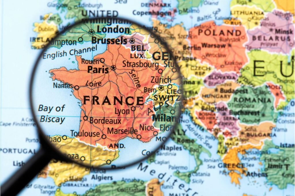 Magnifying glass over map of France