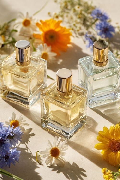 flowers and bottles of perfume