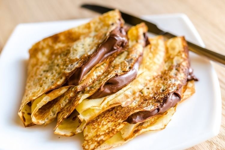Nutella crepes on a plate