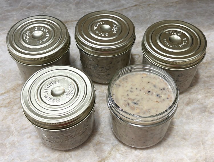 Homemade cream of mushroom soup in jars